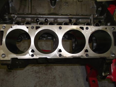 1967 Ford Mustang - Close-up view of an engine block, showing the four cylinder bores.