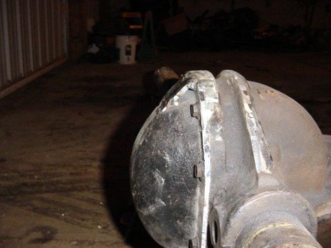 1992 Ford Bronco - Differential housing shown in a workshop setting, likely a spare part.