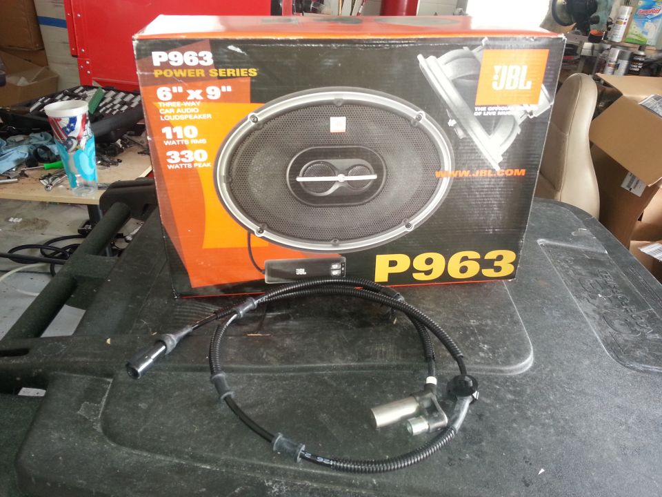 JBL P963 car speaker box and an ABS sensor cable