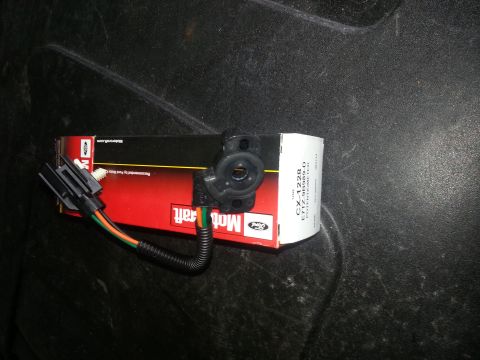 1994 Ford Bronco - A Motorcraft throttle body sensor, part number CX-1228, is shown with its wiring harness.