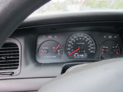 2001 Ford Crown Victoria - The dashboard of a 2001 Ford Crown Victoria displays mileage of 114,756 and various other gauges.
