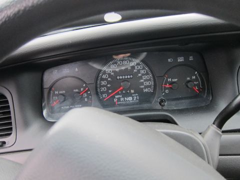 2001 Ford Crown Victoria - Dashboard gauges for a 2001 Ford Crown Victoria display 92,266 miles and indicate fuel and temperature levels.
