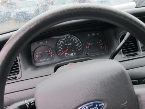 2001 Ford Crown Victoria - The dashboard of a 2001 Ford Crown Victoria displays the odometer reading and various gauges.