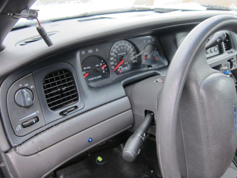 2001 Ford Crown Victoria - Interior view of a 2001 Ford Crown Victoria, displaying the dashboard and instrument cluster.