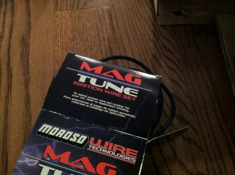 1978 Ford Bronco - A box of Mag Tune ignition wire set is shown on a wooden surface.