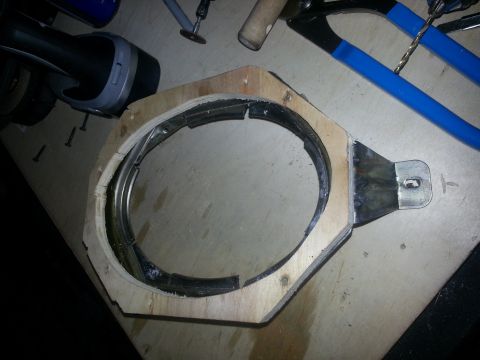 1994 Ford Bronco - A custom-made part, possibly for a vehicle, is shown with tools in the background.