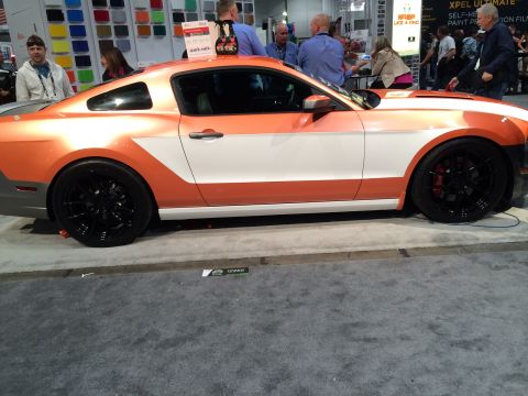 2013 Ford Mustang - Side view of a custom painted Ford Mustang at an auto show.