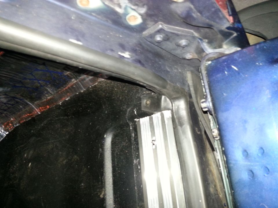 Close-up of a vehicle body seam and corner panel area