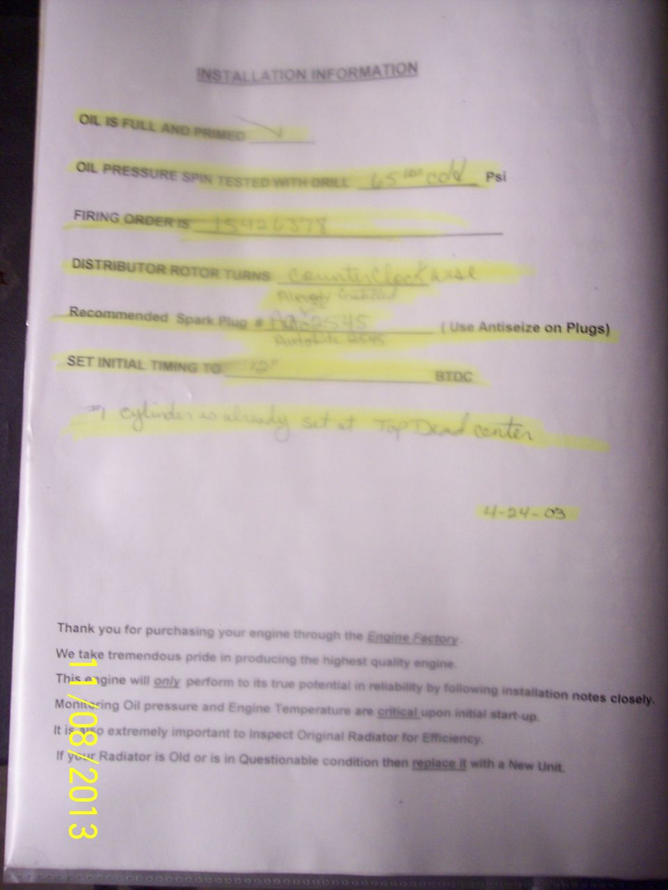 Installation Information document with handwritten notes on engine setup.
