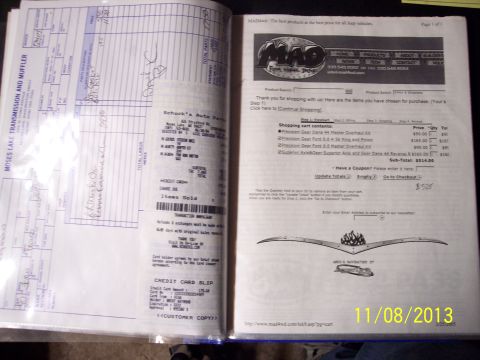 1990 Ford Bronco - This image shows an open document, possibly a manual or build book, with printed text and diagrams.