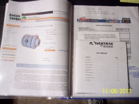 1990 Ford Bronco - A webpage displays an Aussie Locker differential part next to a Powertrax user manual.
