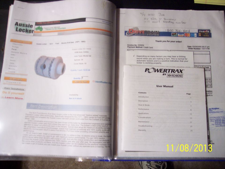 Open binder with a webpage showing an Aussie Locker part and a user manual