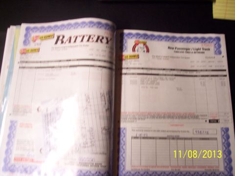 1990 Ford Bronco - Vehicle service documents are shown in an album, dated 11/08/2013.