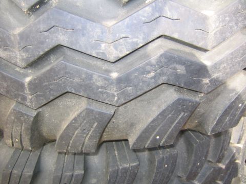 1978 Ford Bronco - Close-up view of a tire's aggressive tread pattern.