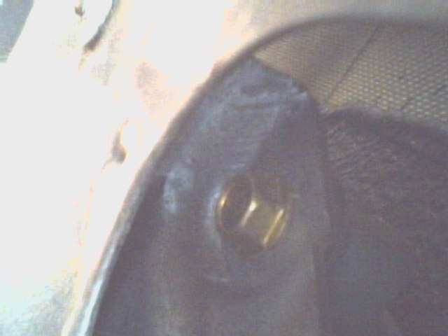 This is a side shot showing the upper dimple and the bolt behind it.