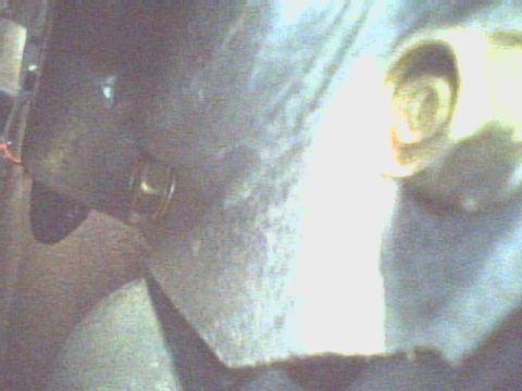 1990 Ford Bronco - This is a side shot showing the lower bolt behind the lower dimple.
