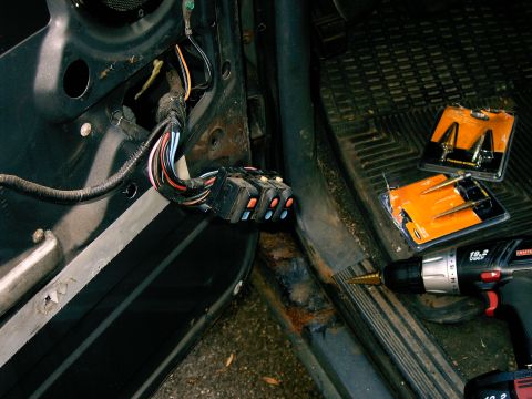 1990 Ford Bronco - Access holes completed, just an over view shot of the work done and what I used to make the holes. Got the bits from harbor freight