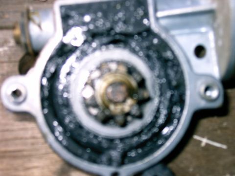 1990 Ford Bronco - Again too blurry but all the black stuff is the grease with what is left of the original plastic plugs.