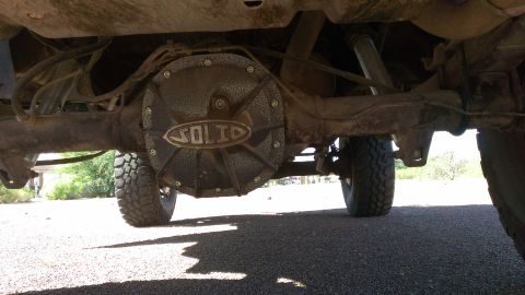 1996 Ford Bronco - Underside view of a truck or SUV's rear differential, a prominent 'SOLID' logo. Year not discernible from this angle.