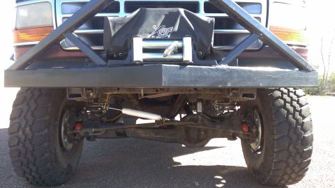 1996 Ford Bronco - Rear view of a 1996 Ford Bronco showing the axle, suspension, and a winch.
