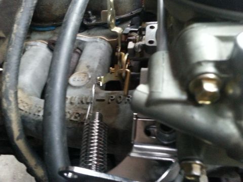1981 Ford Bronco - Carburetor detail showing 'POR' marking and a spring mechanism.