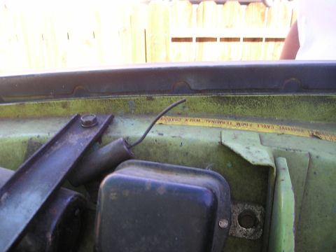 1975 Ford Courier - A yellow warning label is visible in the engine bay, reading "POSITIVE CABLE FROM TERMINAL WHEN CHARGING."