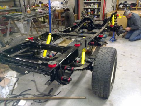 1984 Ford Bronco - Chassis rebuild in progress with new suspension components installed.