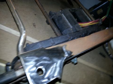 1994 Ford Bronco - This photo shows interior components of a vehicle, including a metal bracket and wiring.