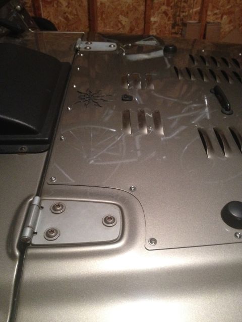 2005 Jeep Wrangler - Detail of a Jeep hood showing a spider decal and scuff marks.
