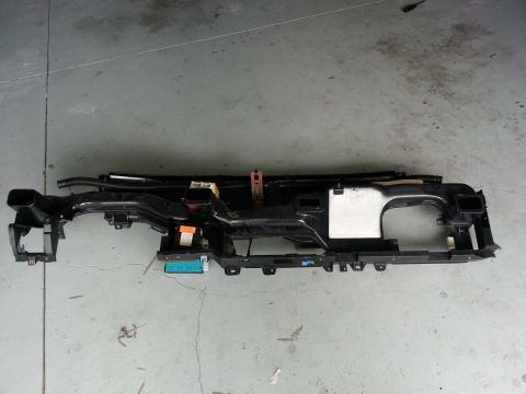 1994 Ford Bronco - Dashboard frame removed from a vehicle, showing internal structure and components.