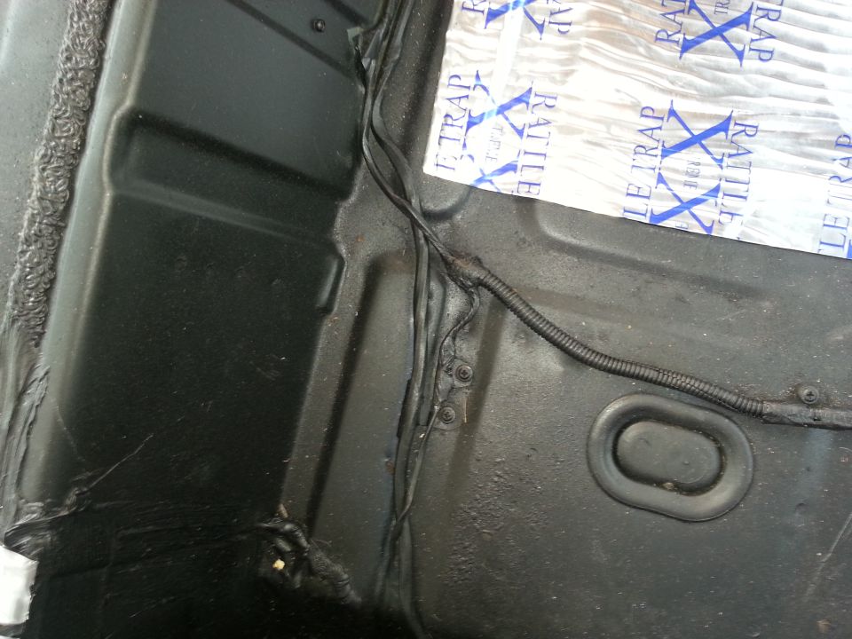 1994 Ford Bronco interior showing sound deadening material on floor pan