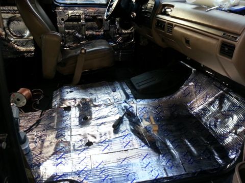 1994 Ford Bronco - Sound deadening installation in progress on the interior of a 1994 Ford Bronco.