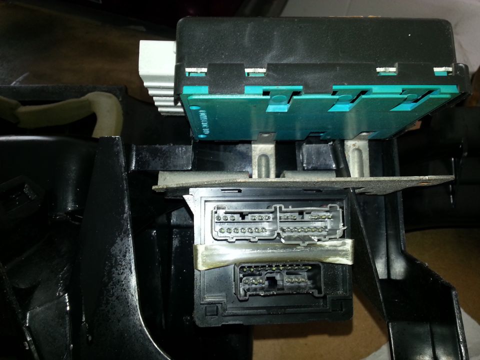Close-up of automotive electrical connectors and wiring harness