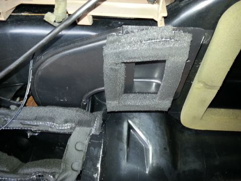 1994 Ford Bronco - Close-up of a car's interior dashboard vent system, showing insulation and ductwork.