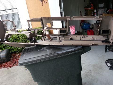 1994 Ford Bronco - A disassembled dashboard unit is shown, removed from its original vehicle for repair or replacement.