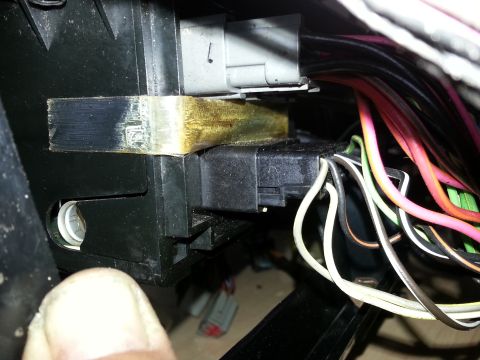 1994 Ford Bronco - Vehicle wiring harness and connectors are visible in this close-up shot.