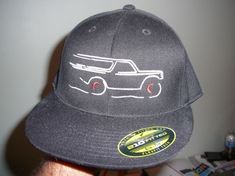1988 Ford Bronco - A black baseball cap displays an embroidered outline of a Bronco, with red accents on the wheels.