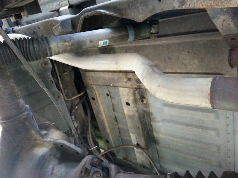 1992 Ford Bronco - Underside view of a 1992 Ford Bronco's exhaust system and driveshaft.