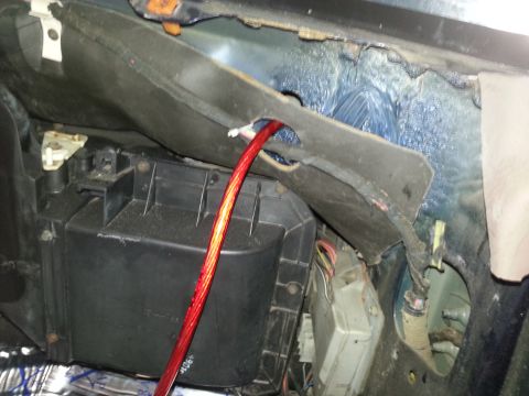 1994 Ford Bronco - Interior view of car ductwork and wiring, with a red cable visible.