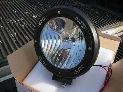 1988 Ford Bronco - A new HID off-road light is unboxed and ready for installation.