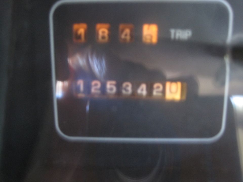 Digital odometer reading 125342 and trip meter reading 184.