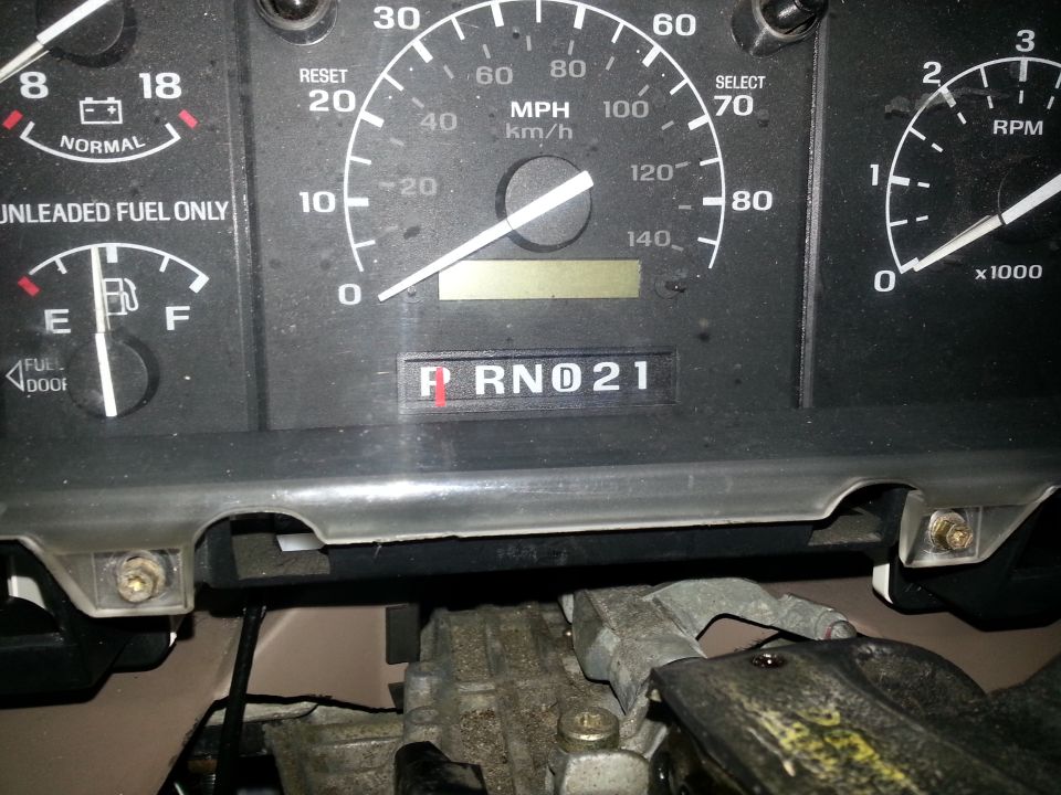 Photo of instrument cluster gauges showing speedometer and fuel