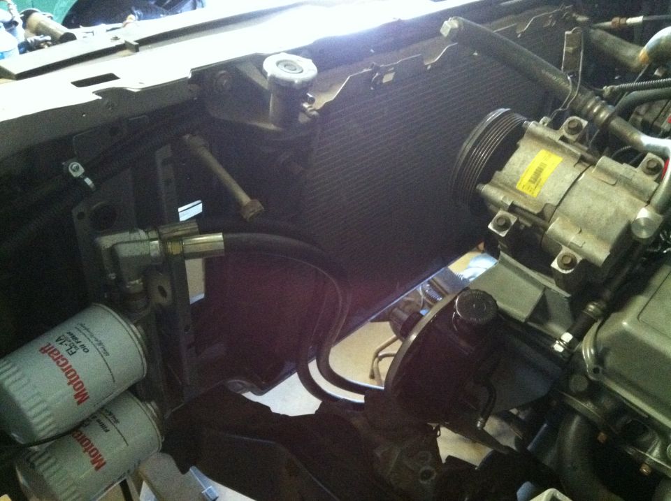 My remote oil filter setup and that big ass radiator out of a forestry dept F-350.