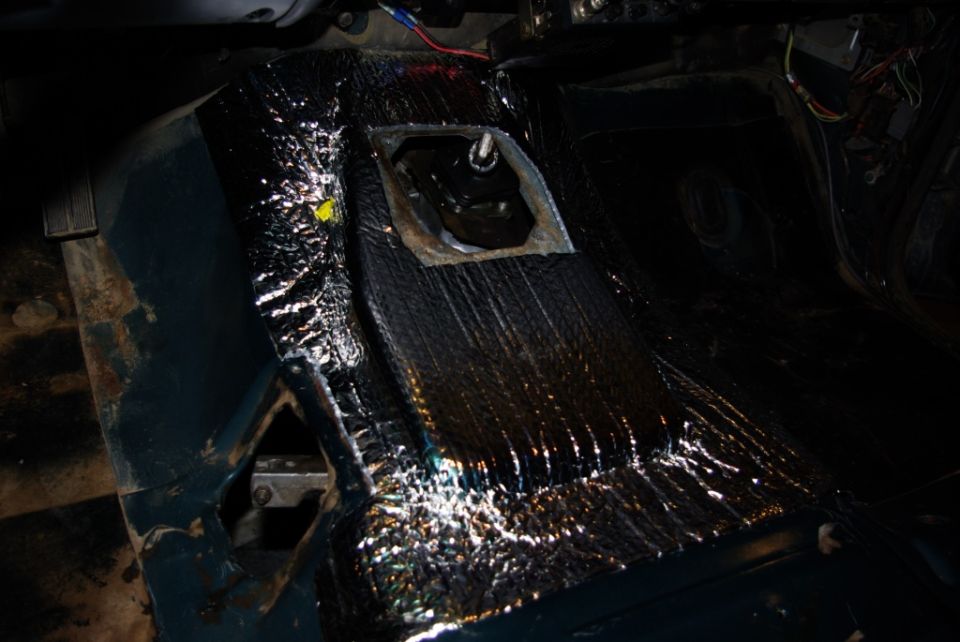 Interior transmission tunnel with sound deadening material applied