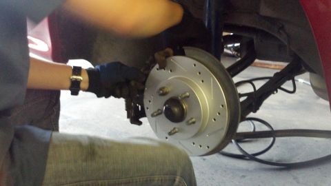 1996 Ford Taurus - Replacing brake rotor and caliper on a vehicle.