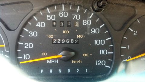 1996 Ford Taurus - The vehicle's odometer shows 229,682 miles, and the speedometer is visible.