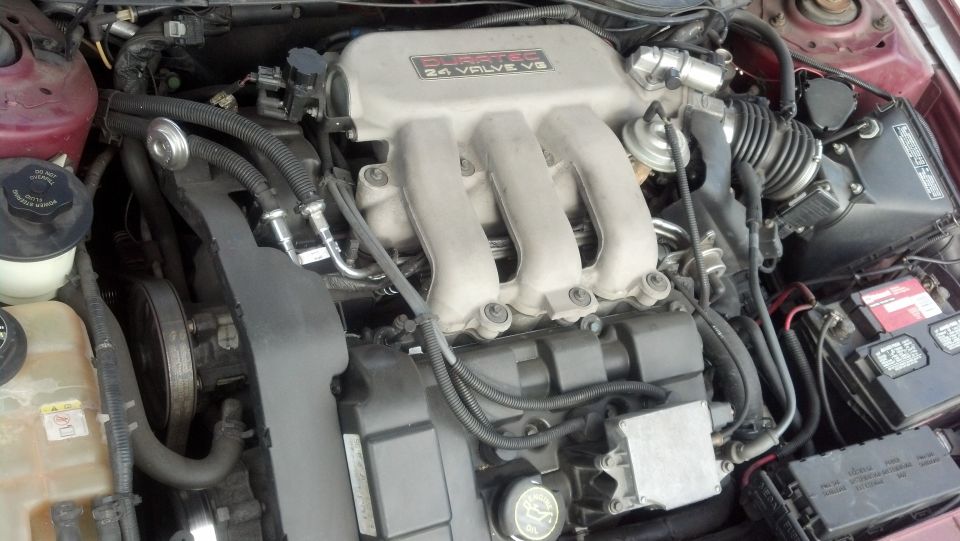 Ford Taurus engine bay with 24 valve V6 engine cover