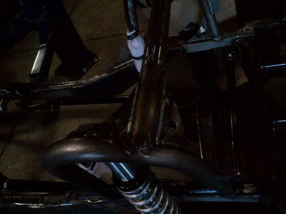 close-up of vehicle frame with suspension components