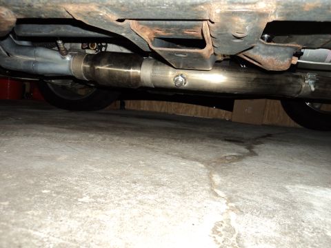 2004 Mercury Grand Marquis - Underside view of a vehicle's exhaust system, stainless steel piping and a catalytic converter.