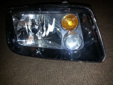 2002 Volkswagen Jetta - Close-up of a single Volkswagen Jetta headlight assembly.